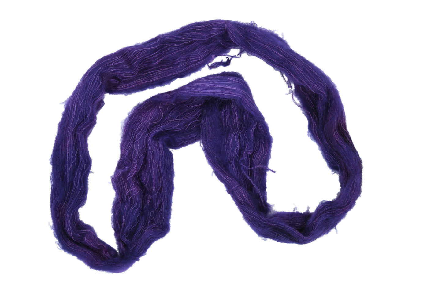 An unfolded hank of Barn Yarn hand-dyed mohair yarn in colorway Grape-ly Appreciated showing vivid purple tones, ideal for eye-catching knitting and crochet creations.