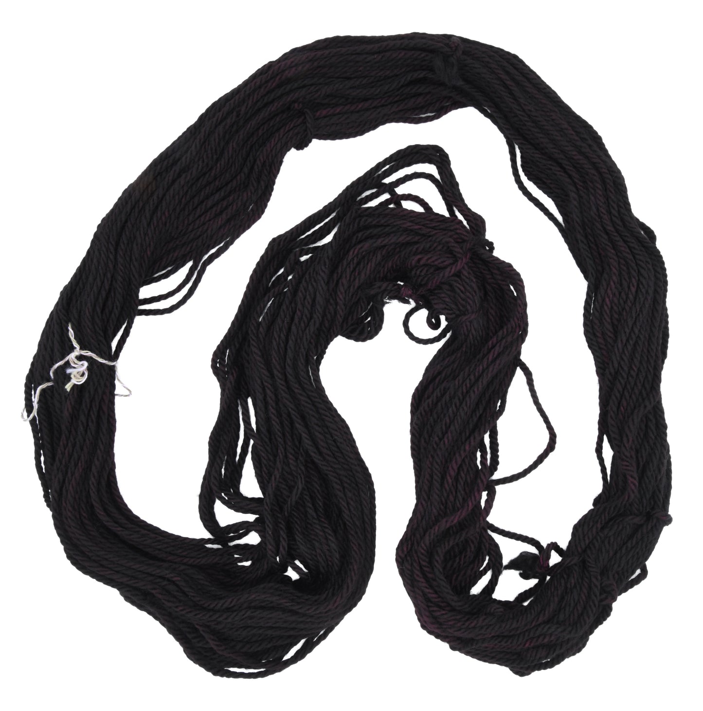 Barn Yarn unfolded skein of Shiraz bulky weight hand-dyed yarn in a deep, dark burgundy, ideal for knitting and crochet projects needing rich, wine-inspired color.