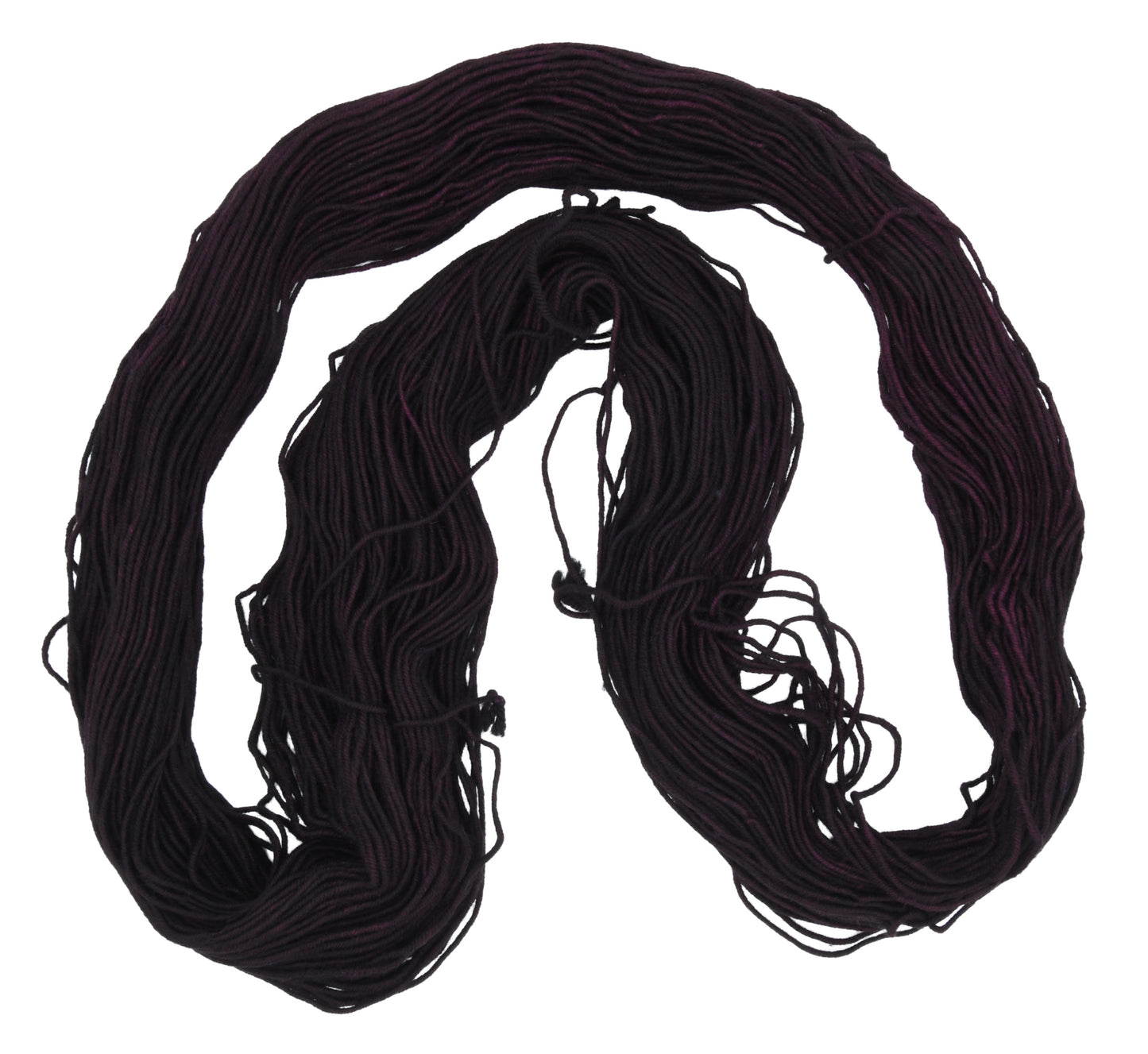 Barn Yarn unfolded skein of Shiraz DK weight hand-dyed yarn in a deep, dark burgundy, ideal for knitting and crochet projects needing rich, wine-inspired color.