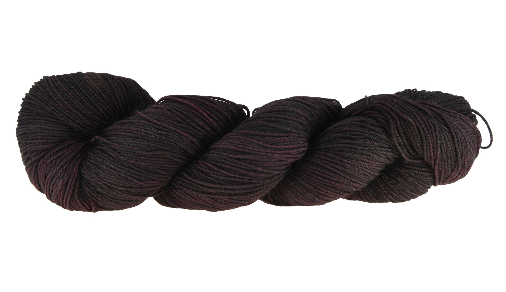 Barn Yarn twisted skein of Shiraz fingering weight hand-dyed yarn in a deep, dark burgundy, ideal for knitting and crochet projects needing rich, wine-inspired color.