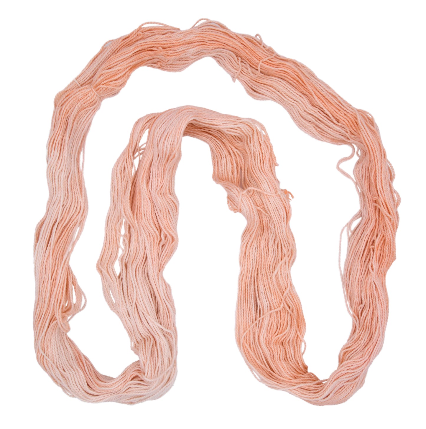 Son of a Peach yarn shown in a spread-out hank — DK weight hand-dyed Pima cotton in light peach hues with gentle tonal variation and clearly defined 2-ply twist