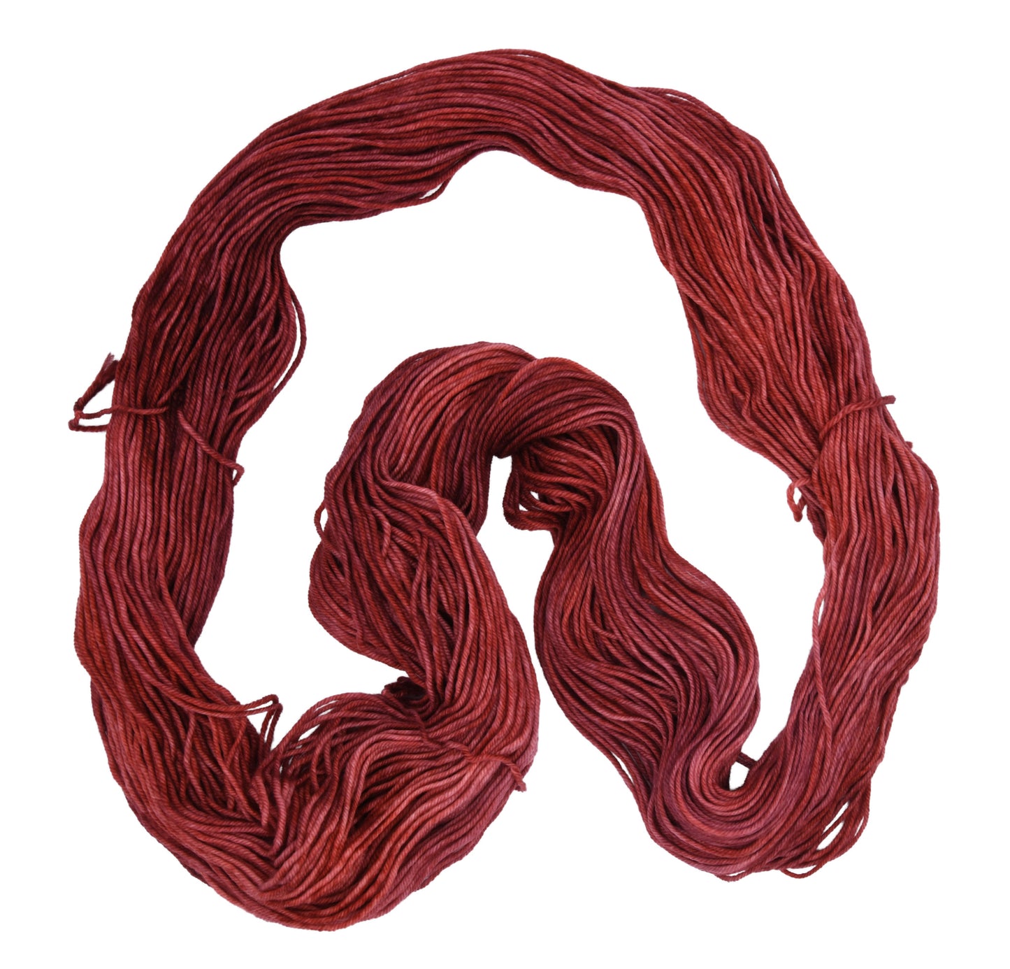 Unfolded hank of Wine Rose DK weight yarn — richly dyed in a romantic dark rose color, showcasing the depth and tonal variation of the hand-dyed fiber.