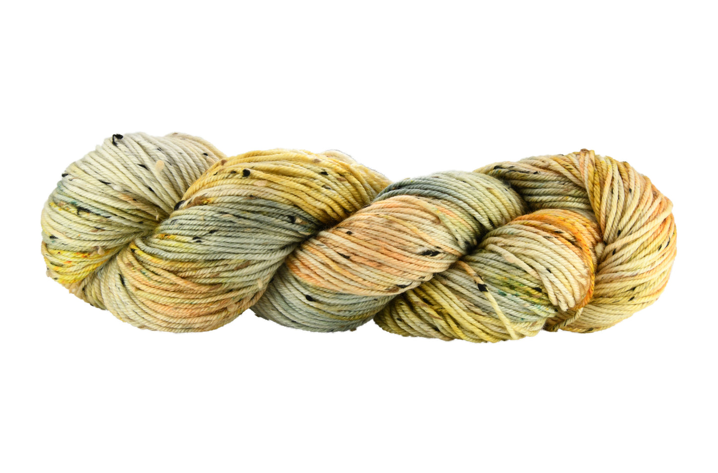 Winter Pumpkin Tweed Yarn — hand-dyed in soft sage green and apricot with gold speckles, shown in a twisted hank that emphasizes the slub texture and earthy tonal blend
