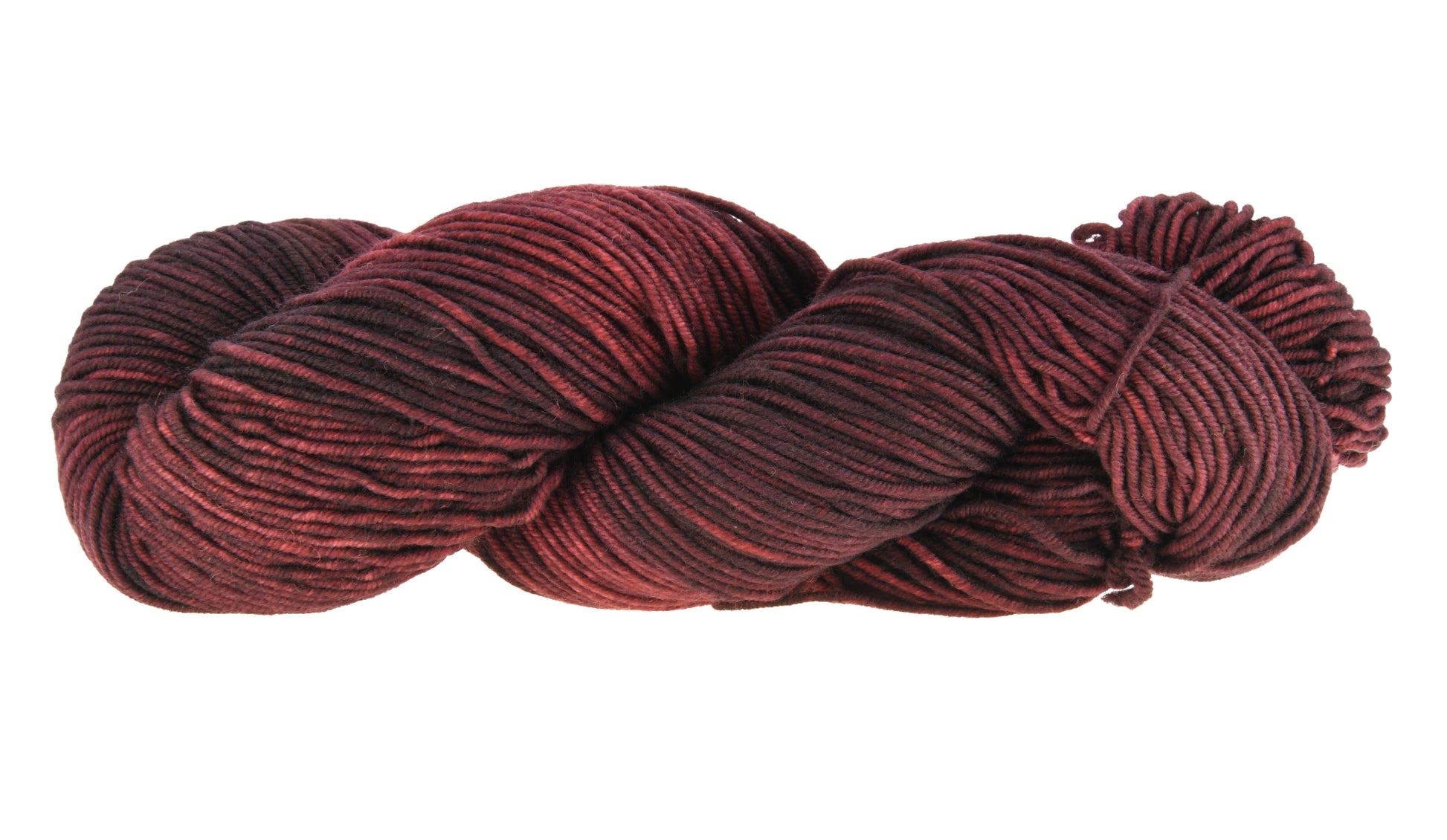 A twisted skein of Barn Yarn hand-dyed DK weight yarn in colorway Chocolate Moose; a rich, earthy brown shade, perfect for warm and cozy knitting and crochet projects.