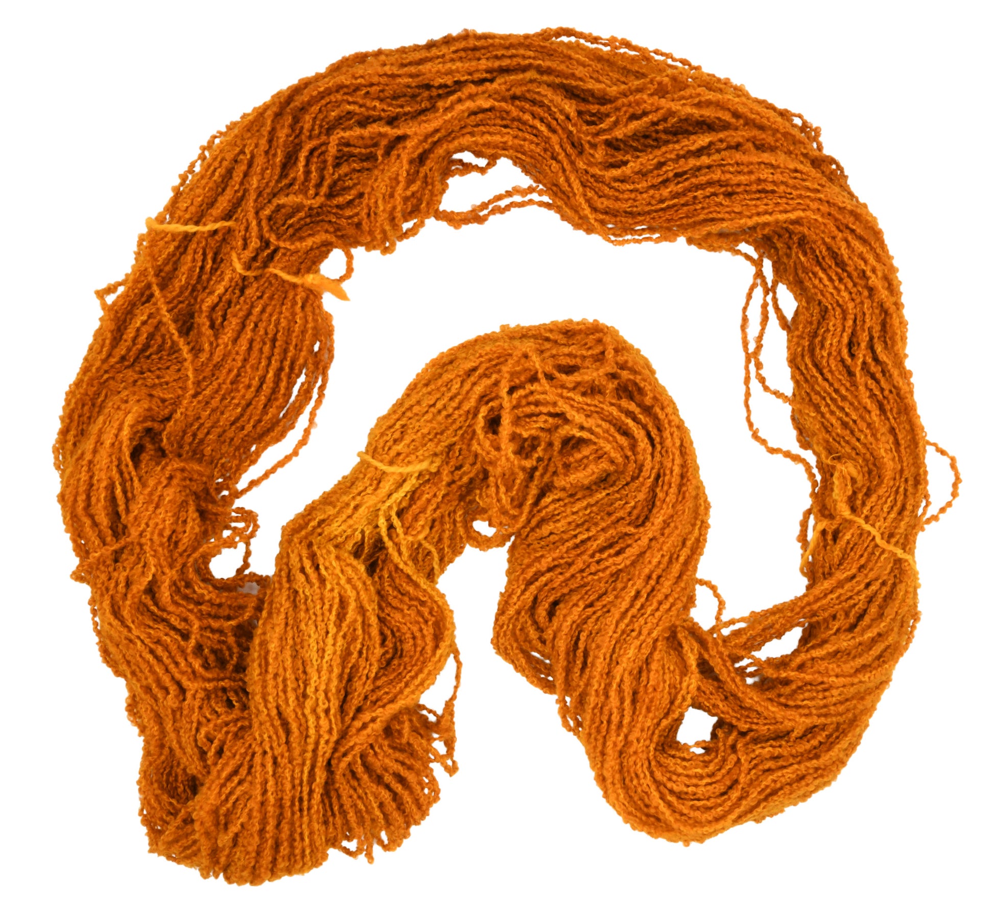 An unfolded skein of Barn Yarn hand-dyed boucle DK weight yarn in colorway Golden Era, a radiant golden yellow shade, perfect for warm and luxurious knitting and crochet projects.