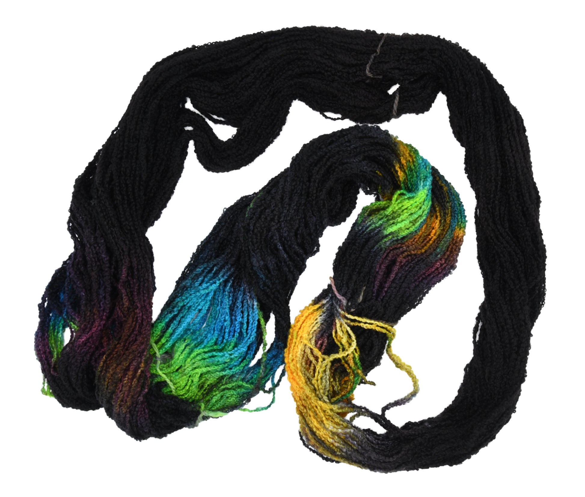 An unfolded skein of Barn Yarn hand-dyed boucle DK weight yarn in colorway Imperial Pumpkin - a black base layered with pumpkin orange, plum, blue, gray, green, and warm browns. Perfect for knitting and crochet projects.