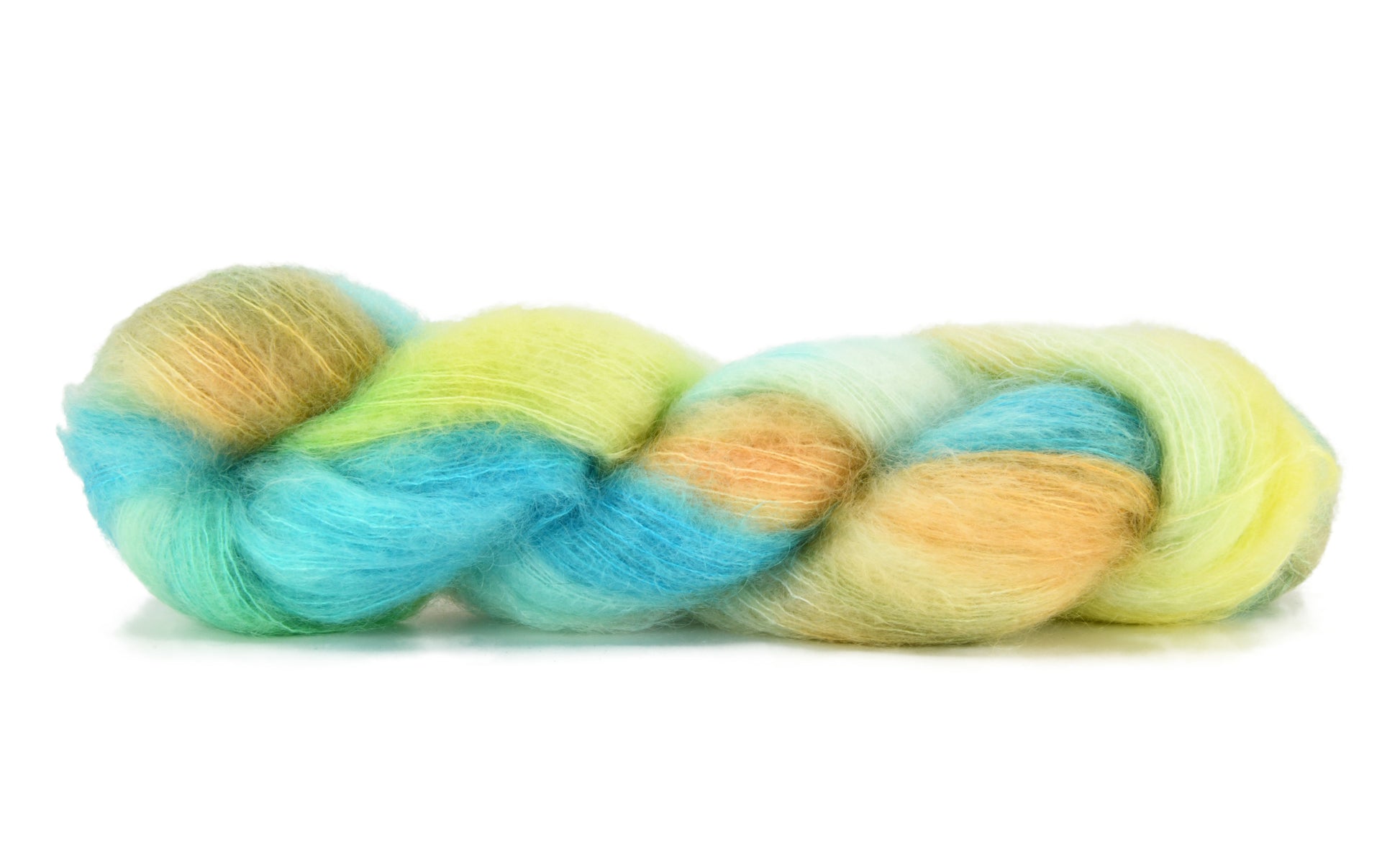 A twisted skein of Barn Yarn hand-dyed mohair yarn in colorway Down by the Seaside with breezy blues, sandy neutrals, and sea-glass greens, perfect  knitting and crochet.