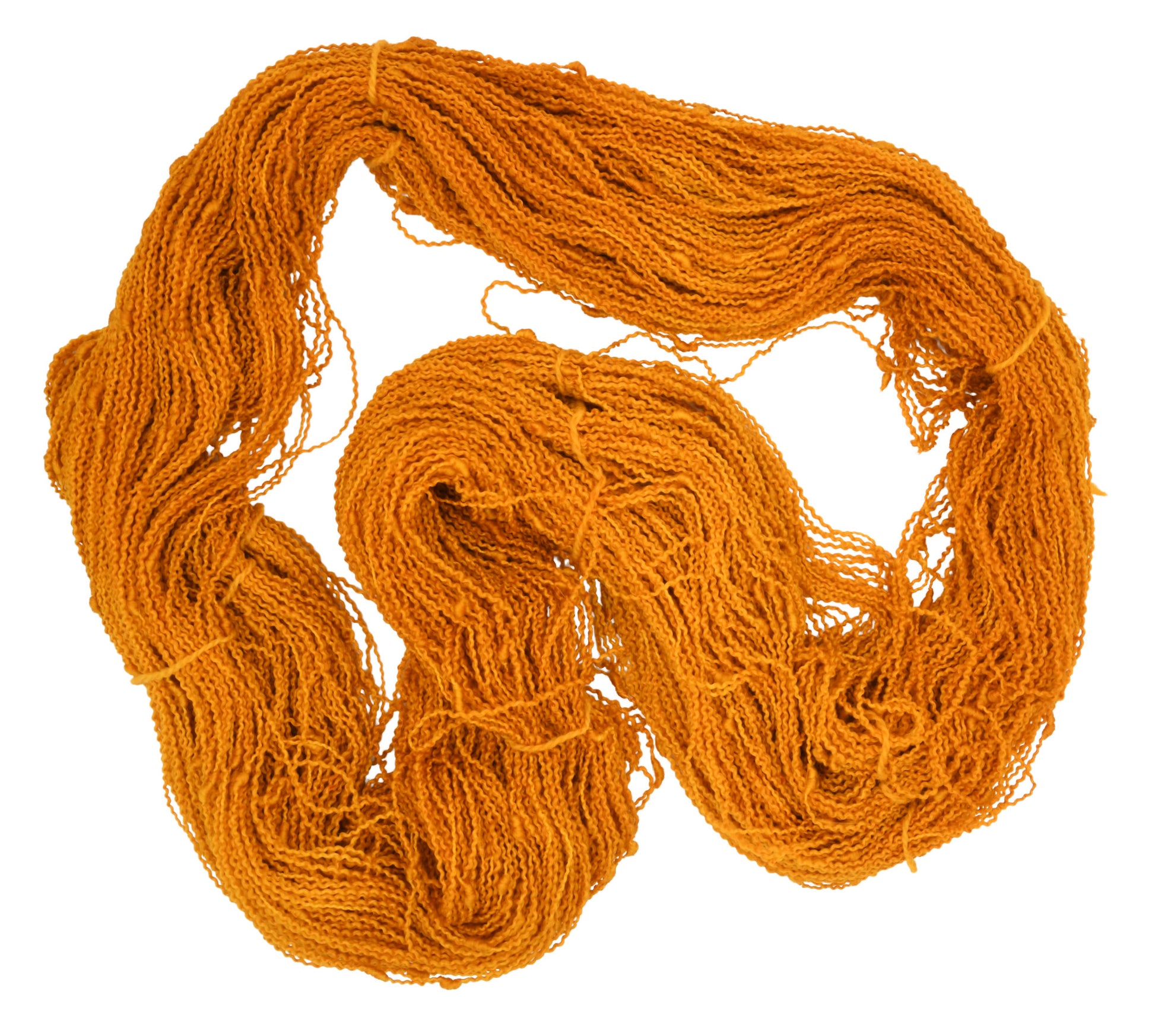 An unfolded skein of Barn Yarn hand-dyed slub yarn in colorway Golden Era, a radiant golden yellow shade, perfect for warm and luxurious knitting and crochet projects.