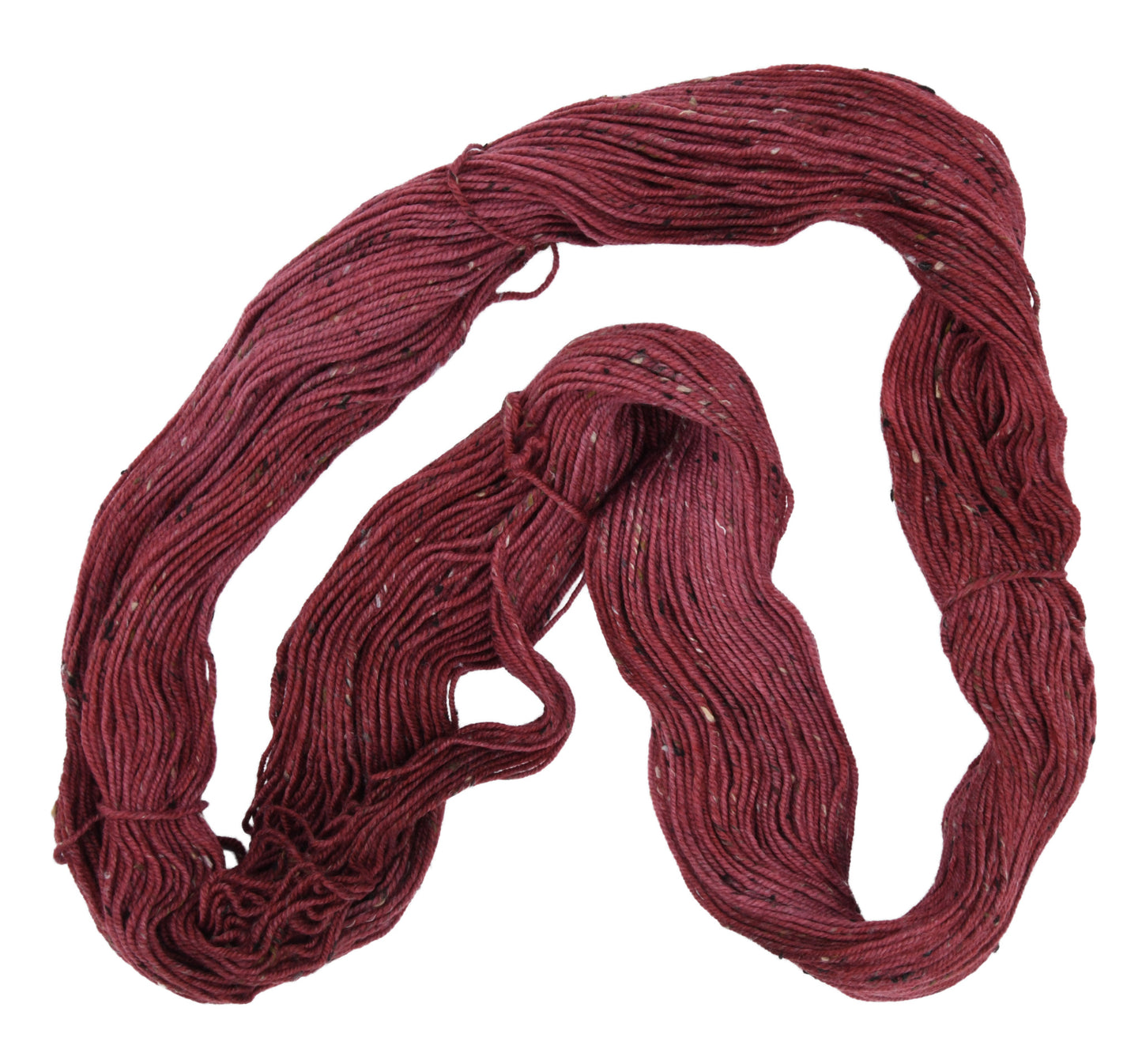 An unfolded skein of Barn Yarn hand-dyed tweed DK weight yarn in colorway Chocolate Moose; a rich, earthy brown shade, perfect for warm and cozy knitting and crochet projects.