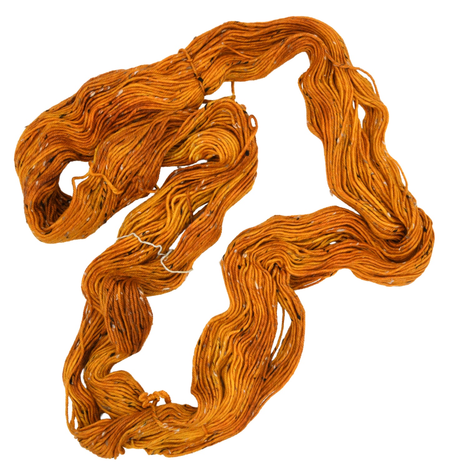 An unfolded skein of Barn Yarn hand-dyed tweed DK weight yarn in colorway Golden Era, a radiant golden yellow shade, perfect for warm and luxurious knitting and crochet projects.