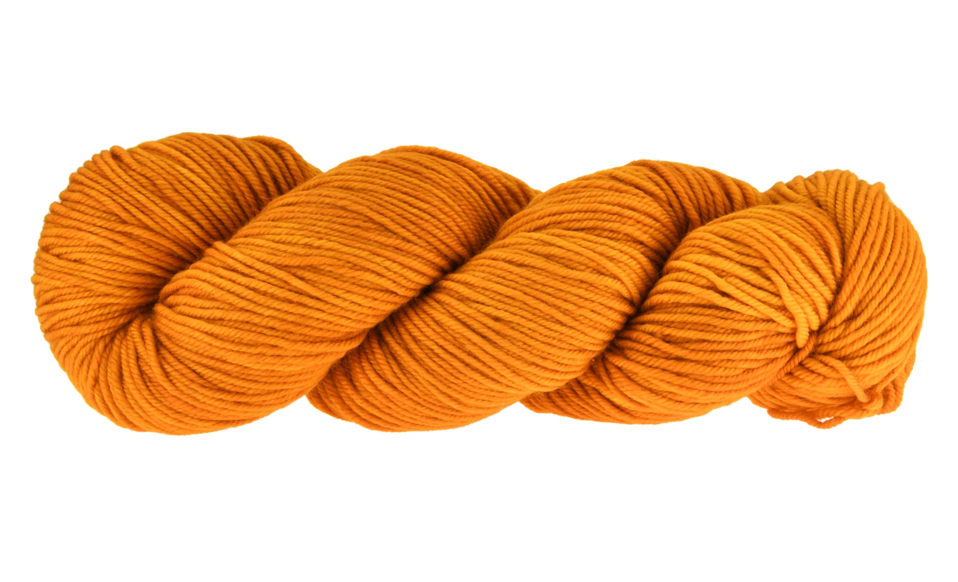A twisted skein of Barn Yarn hand-dyed worsted weight yarn in colorway Golden Era, a radiant golden yellow shade, perfect for warm and luxurious knitting and crochet projects.