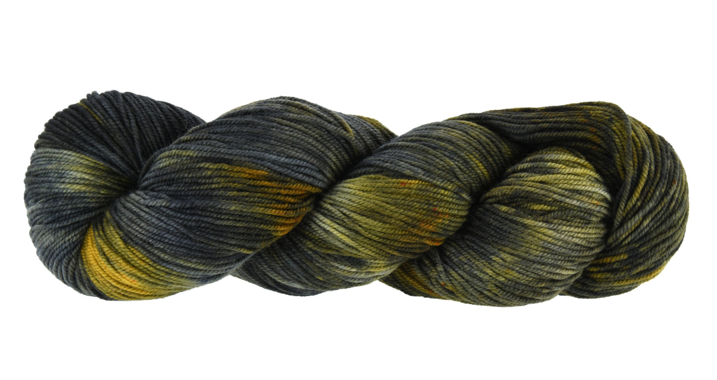 Barn Yarn Tabby Cat DK weight hand-dyed yarn—twisted hank in blended black, toffee, gray and cream ones inspired by tabby cat stripes.